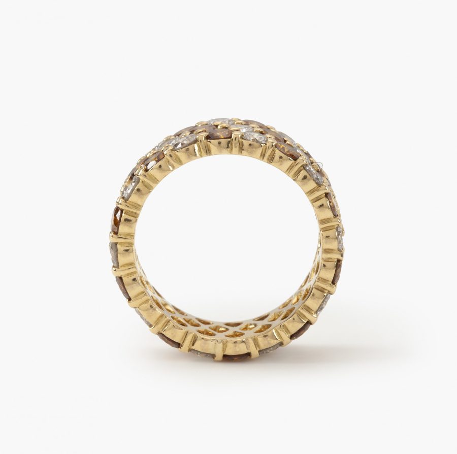 yellow gold eternity ring white and fancy diamonds