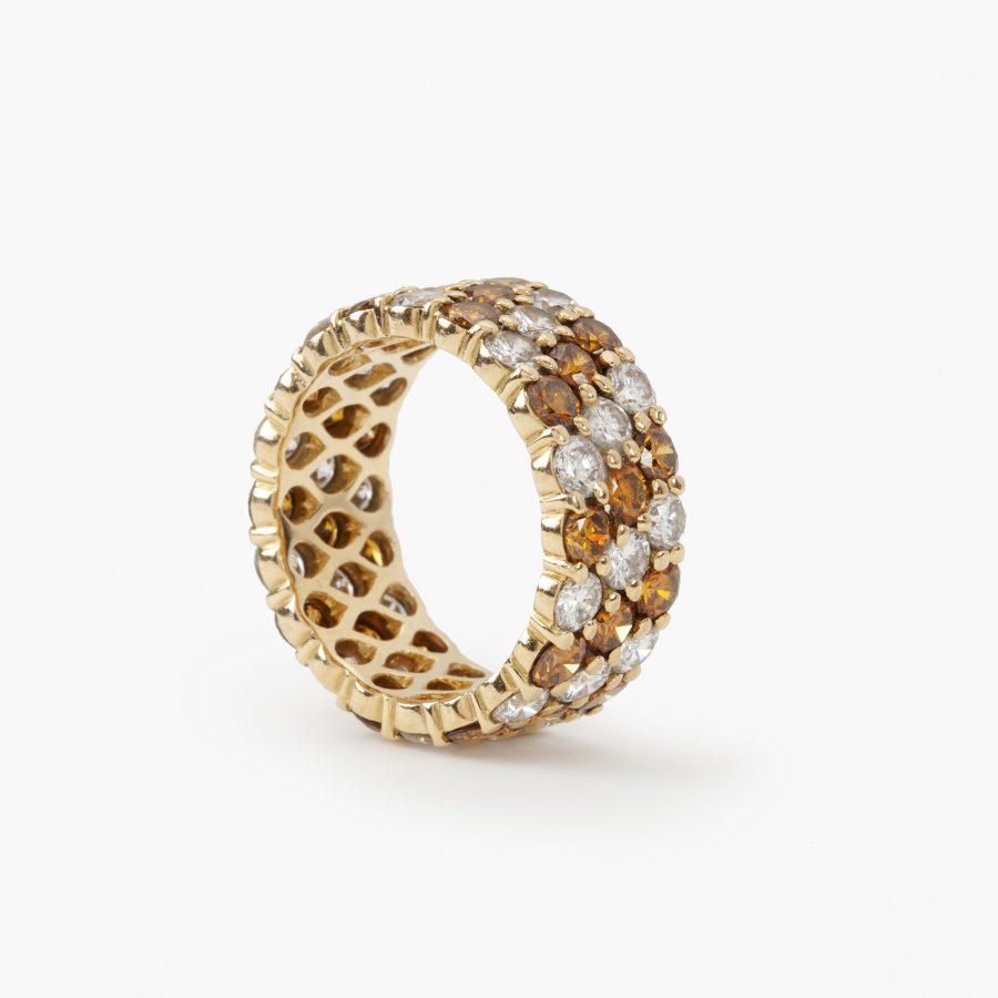 yellow gold eternity ring white and fancy diamonds