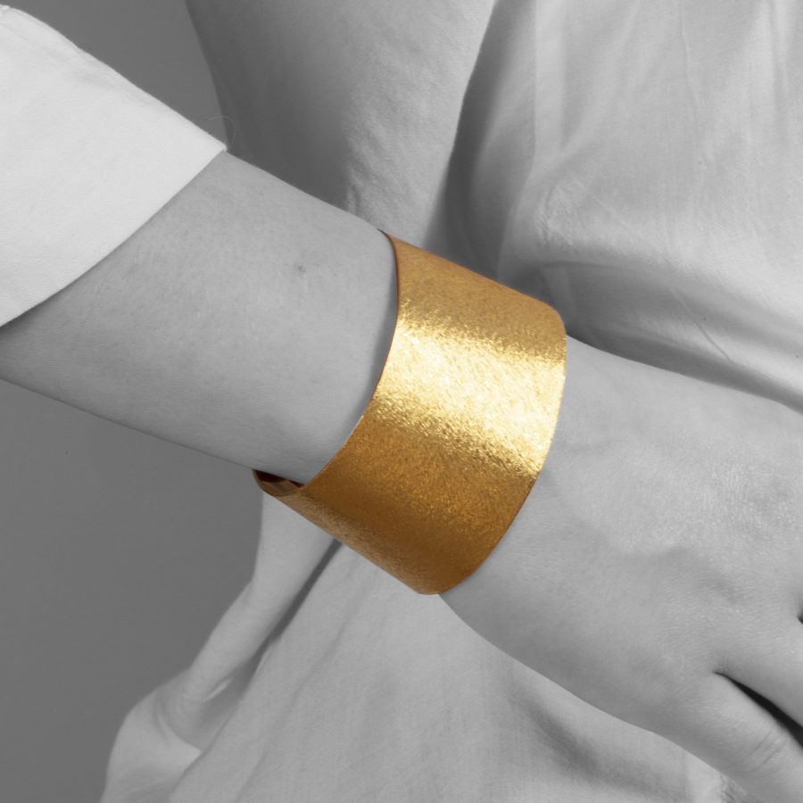 Bvlgari set of two 24 ct gold cuff bracelets 1970s