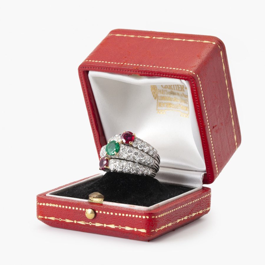 Cartier triple bombé ring diamonds emerald ruby ca 1960