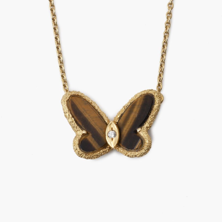 An eighteen carat yellow gold Sweet Alhambra Butterfly pendant necklace set with tiger's eye signed Van Cleef & Arpels, Paris, 1973