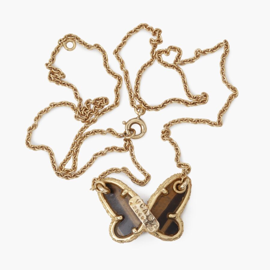 An eighteen carat yellow gold Sweet Alhambra Butterfly pendant necklace set with tiger's eye signed Van Cleef & Arpels, Paris, 1973