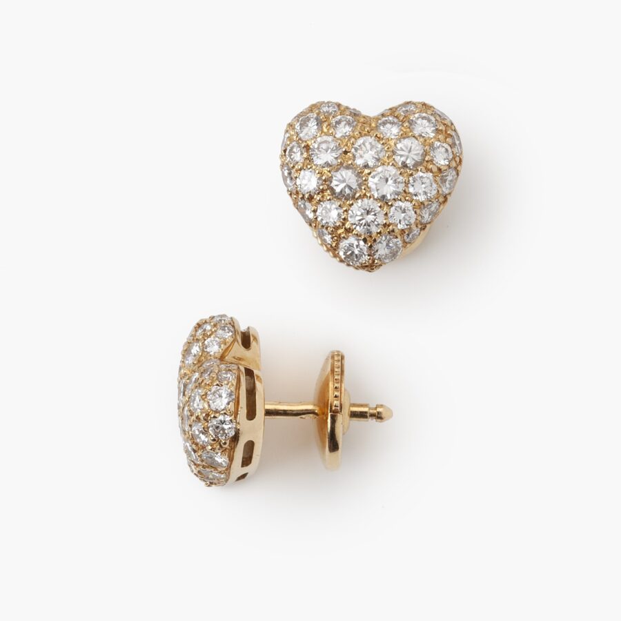 Cartier heart pendant on chain and stud earrings set with diamonds