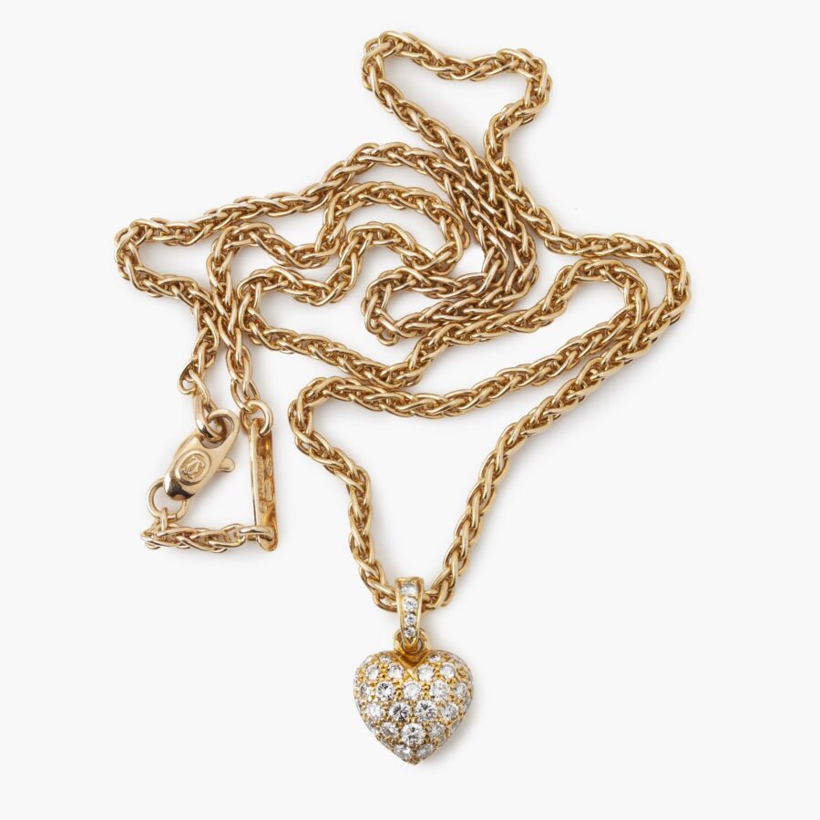 Cartier heart pendant on chain and stud earrings set with diamonds