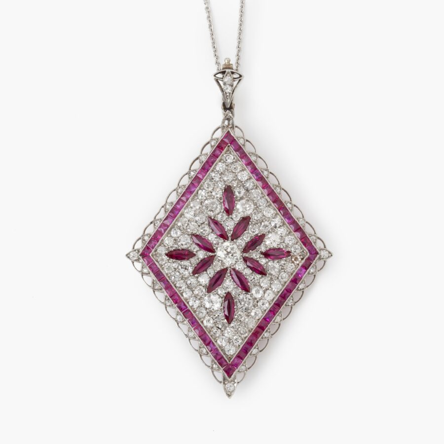 Art Deco yellow gold and platinum pendant locket set with rubies and diamonds made ca 1915