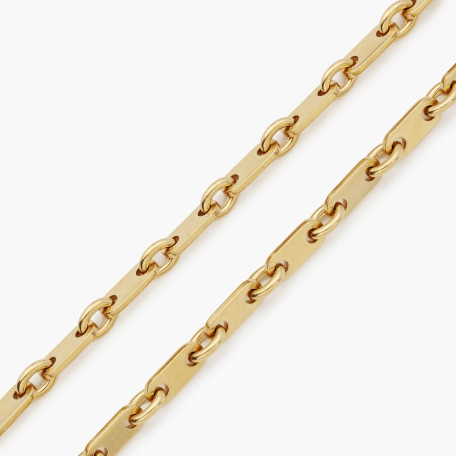 Eighteen carat yellow gold Fidelity longchain signed Cartier Paris, made ca 1990