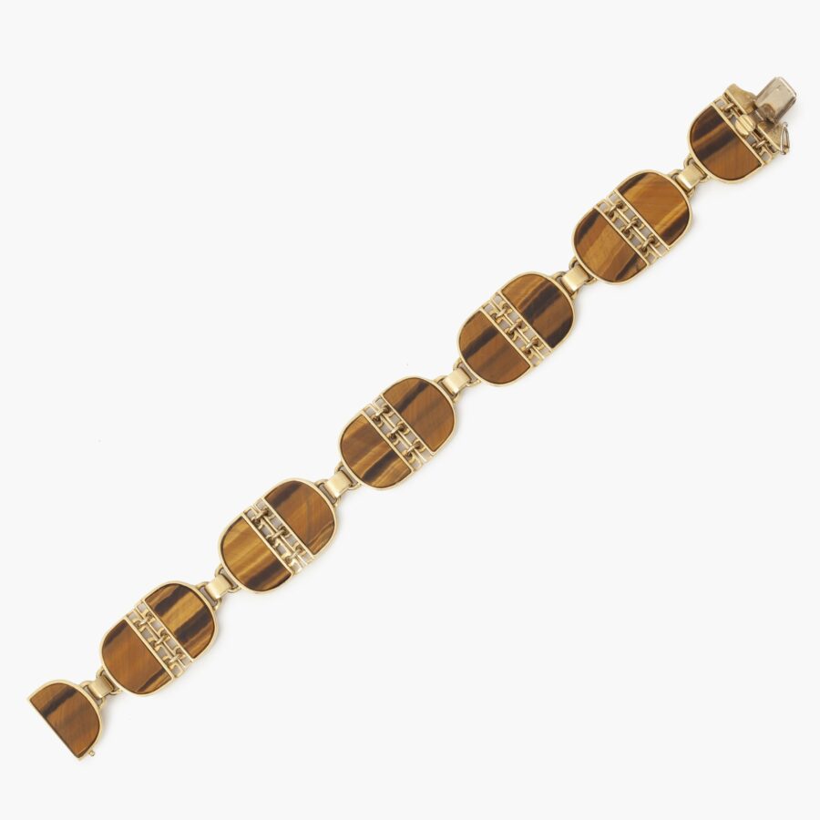 An eighteen carat yellow gold and tiger's eye bracelet signed Gucci, Italy, ca 1970