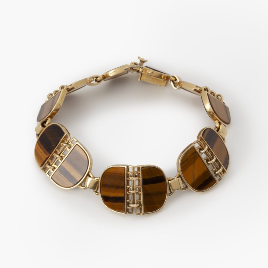 An eighteen carat yellow gold and tiger's eye bracelet signed Gucci, Italy, ca 1970