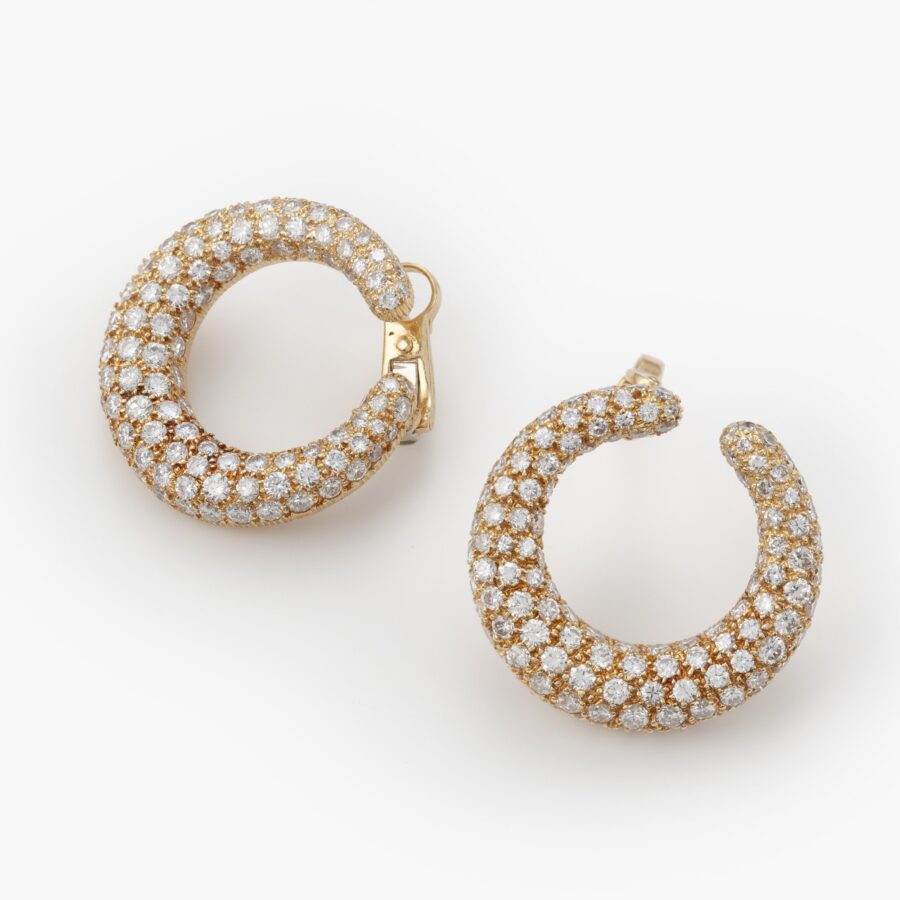 Eighteen carat yellow gold diamond set hoop earrings, signed Cartier, made in France