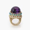 An eighteen carat yellow gold ring set with amethyst, turquoises and brilliant cut diamonds. Signed Cartier Paris, made ca 1960, and numbered. 