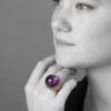 An eighteen carat yellow gold ring set with amethyst, turquoises and brilliant cut diamonds. Signed Cartier Paris, made ca 1960, and numbered. 