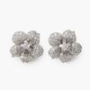 A pair of platinum clip earrings, each designed as a flower set with differently cut diamonds. Signed Cartier, made in London, ca 1950. In original case.