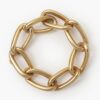 An eighteen carat yellow gold curb chain bracelet comprising eight elongated links with a spring clasp with safeguard. Signed Cartier Paris. 