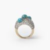An eighteen carat yellow gold and platinum ring of triple bombé design, set with diamonds and turquoise. Signed Cartier Paris, made ca 1960.