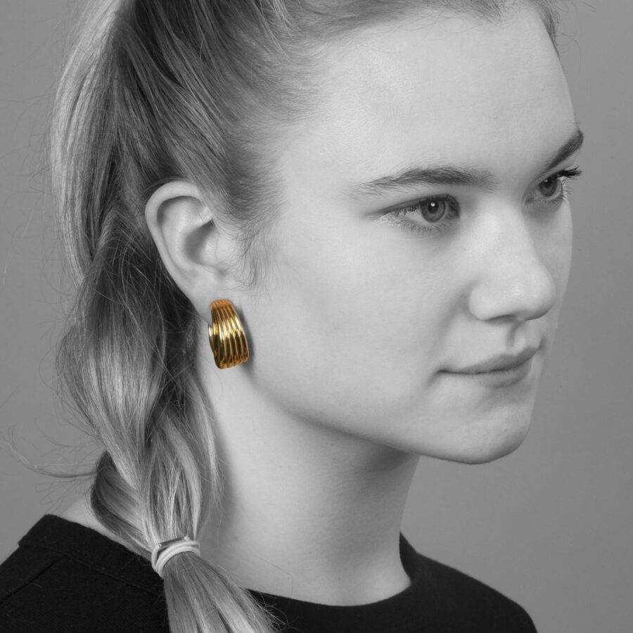 A pair of eighteen carat yellow gold clip earrings. Signed Van Cleef & Arpels, and numbered. Made in Paris, ca 1990. With maker’s mark of A. Vassort, Paris.