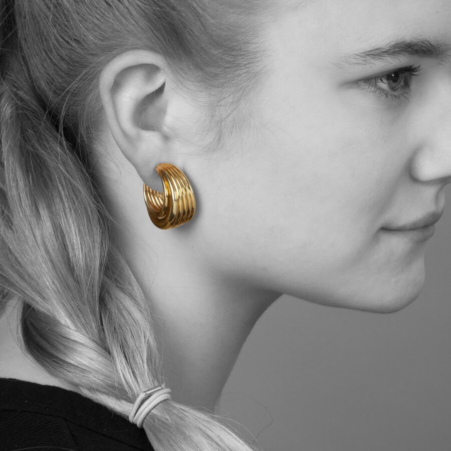 A pair of eighteen carat yellow gold clip earrings. Signed Van Cleef & Arpels, and numbered. Made in Paris, ca 1990. With maker’s mark of A. Vassort, Paris.