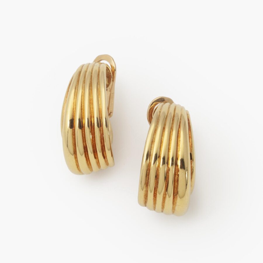 A pair of eighteen carat yellow gold clip earrings. Signed Van Cleef & Arpels, and numbered. Made in Paris, ca 1990. With maker’s mark of A. Vassort, Paris.