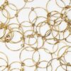 An eighteen carat yellow gold necklace with matching bracelet consisting of many strings of irregular round links. Signed Cartier, numbered. Made ca 1980.