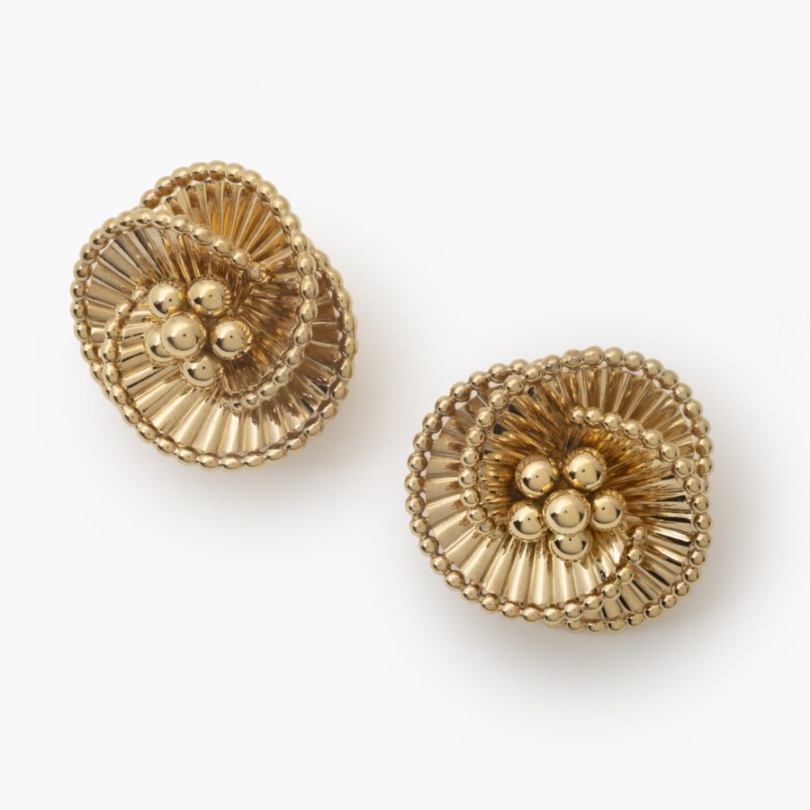 A pair of eighteen carat yellow gold tourbillon earrings designed as three intertwined ribbed ribbonss. Signed Cartier Paris, ca 1950. In original case.