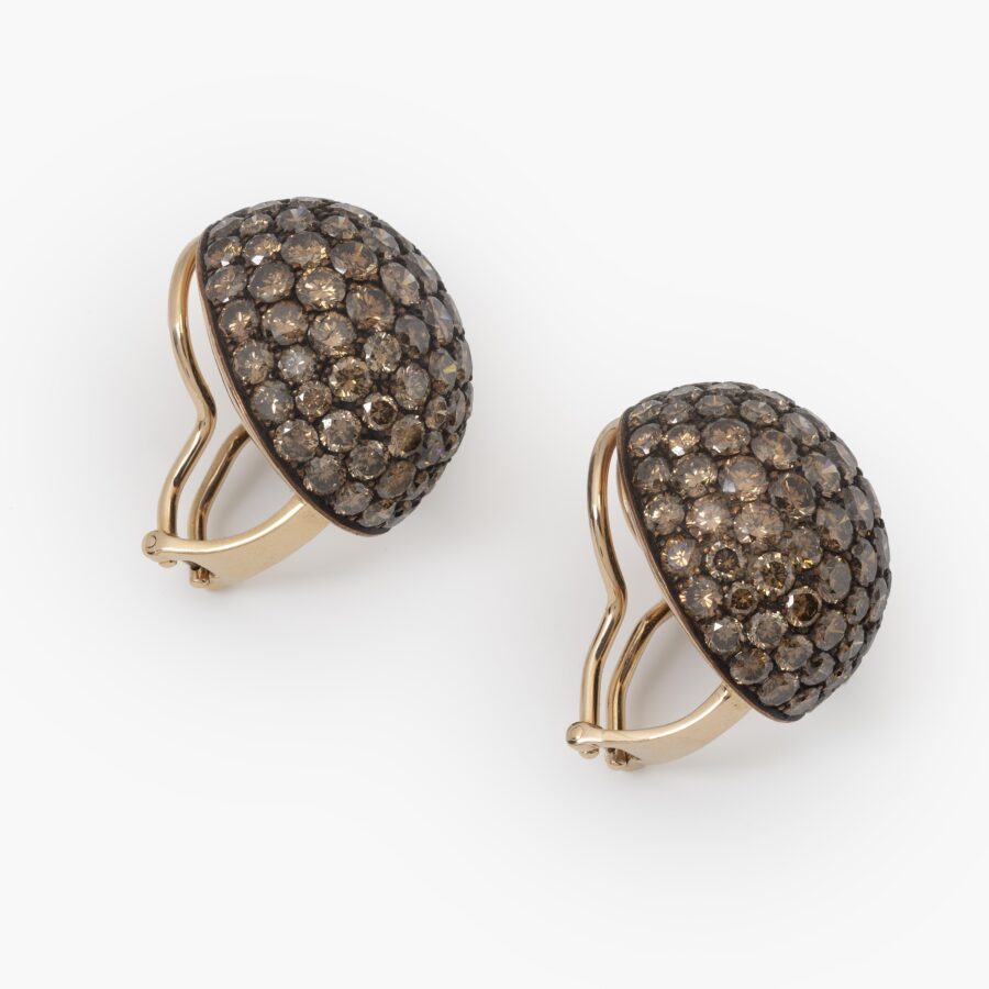 A pair of eighteen carat red gold and copper oval bombé clip earrings, pavé set with brilliant cut brown diamonds. Signed Hemmerle, made in Munich.