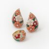 A pair of eighteen carat yellow gold clip earrings and matching ring, all set with coral, diamonds and green agate, signed Van Cleef & Arpels, Paris.