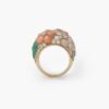 A pair of eighteen carat yellow gold clip earrings and matching ring, all set with coral, diamonds and green agate, signed Van Cleef & Arpels, Paris.