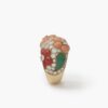 A pair of eighteen carat yellow gold clip earrings and matching ring, all set with coral, diamonds and green agate, signed Van Cleef & Arpels, Paris.