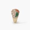 A pair of eighteen carat yellow gold clip earrings and matching ring, all set with coral, diamonds and green agate, signed Van Cleef & Arpels, Paris.