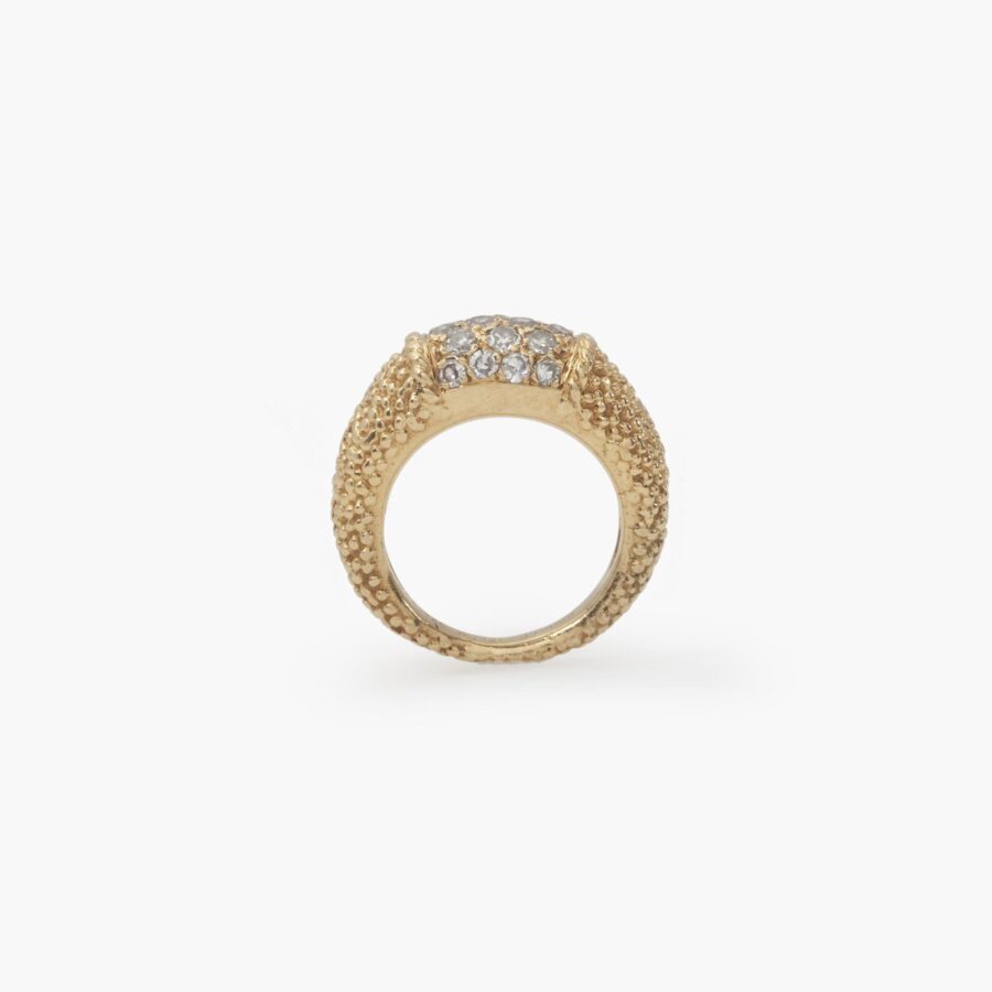 An eighteen carat yellow gold ring of bombé design “Philippine”, set with diamonds and with etched texture. Signed Van Cleef & Arpels, Paris, dated 1969.