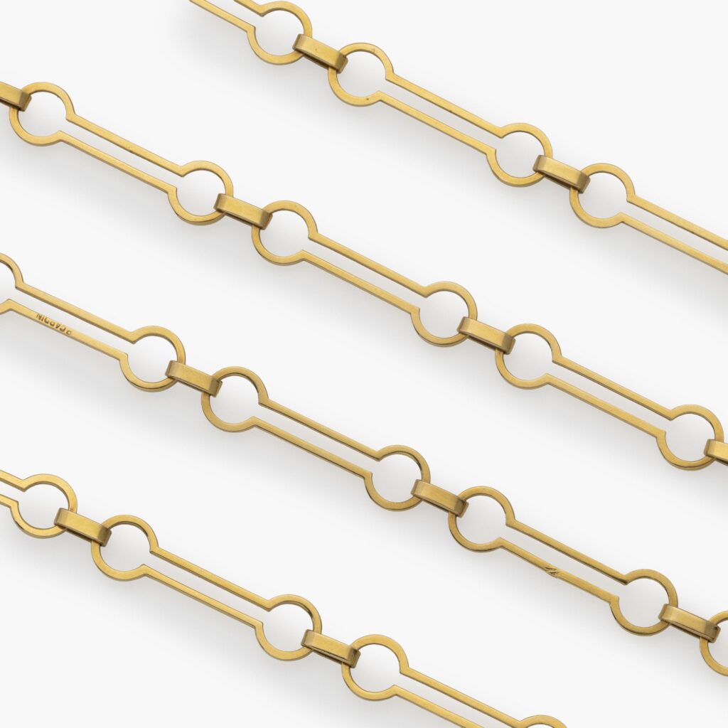 An eighteen-karat yellow gold sautoir composed of open links, without a clasp. Signed P. Cardin, made in Paris, ca 1960.