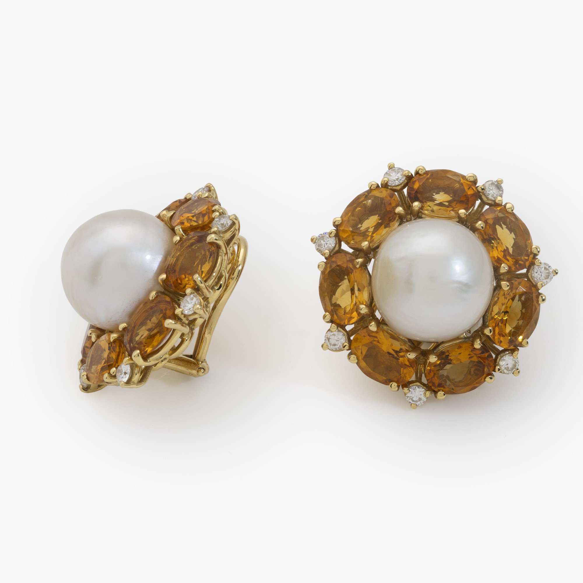 A pair of eighteen-carat yellow gold clip earrings, set with a South Sea pearl, citrines and diamonds. Signed Seaman Schepps, made in the USA.