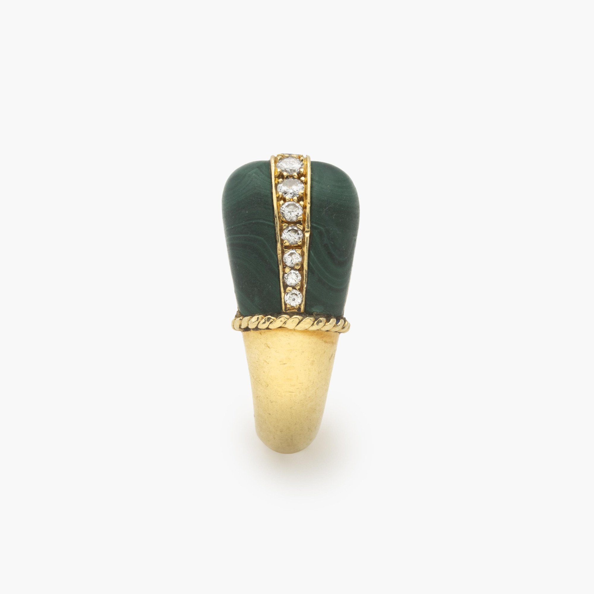 An eighteen-karat yellow gold ring set with malachite and brilliant-cut diamonds. Signed Cartier and numbered, made in Paris, circa 1980.