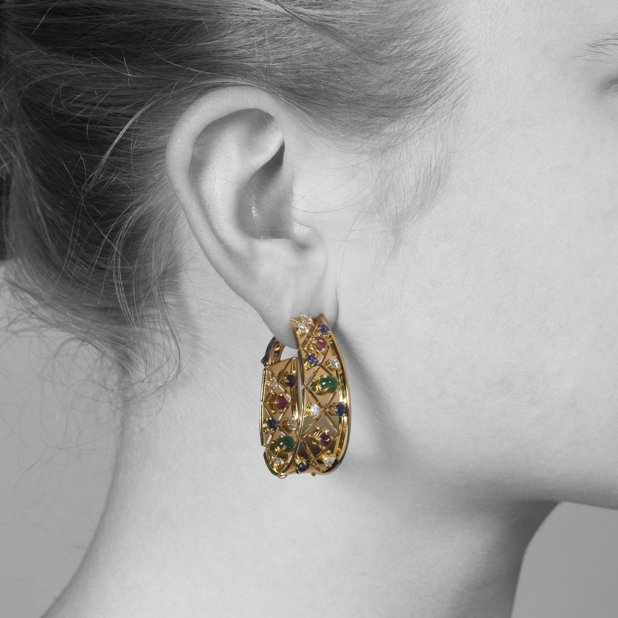 A pair of eighteen-carat yellow gold ´Liberty´ earrings, set with diamond, sapphire, ruby and emerald. Signed Cartier, made in Paris, circa 1980.