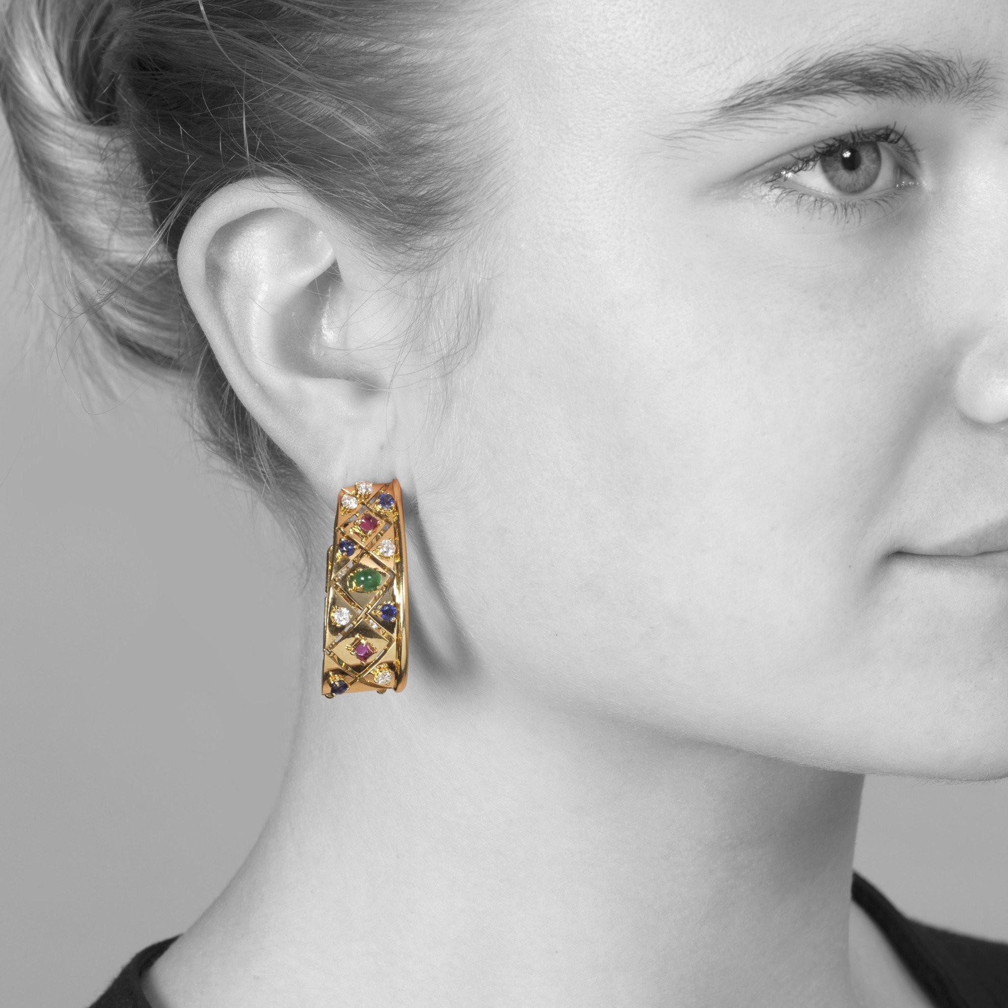A pair of eighteen-carat yellow gold ´Liberty´ earrings, set with diamond, sapphire, ruby and emerald. Signed Cartier, made in Paris, circa 1980.