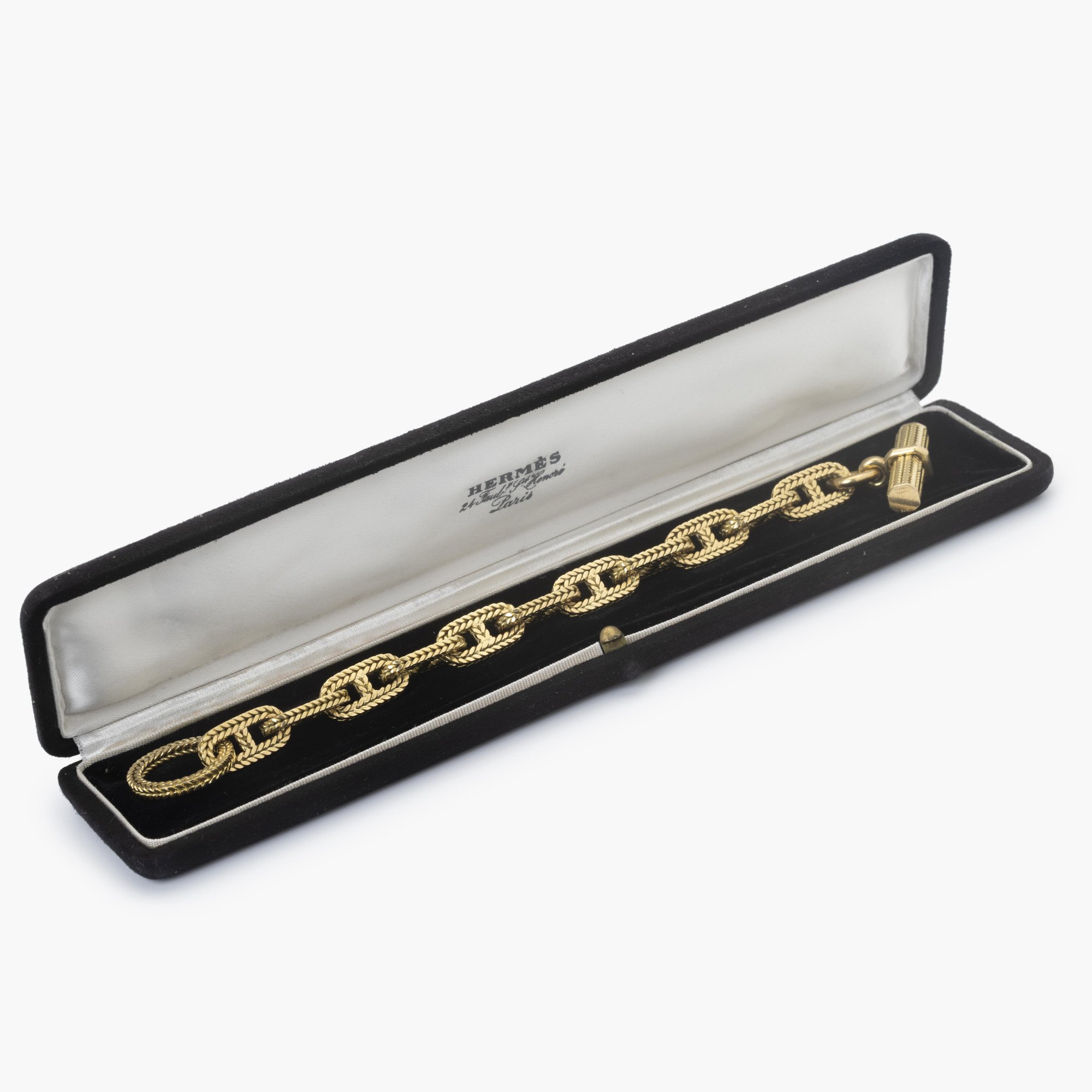 An eighteen carat yellow gold “Chaîne d’Ancre” bracelet. Signed Hermès Paris, numbered. Made by Georges Lenfant, Paris. With original case.