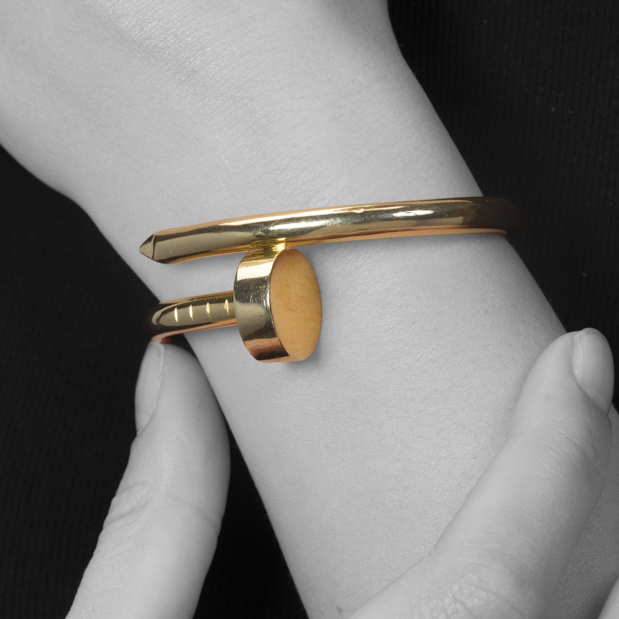 An eighteen-karat yellow gold “Juste un Clou” bracelet. Signed by Aldo Cipullo, dated 1971; the year in which the original design was launched.