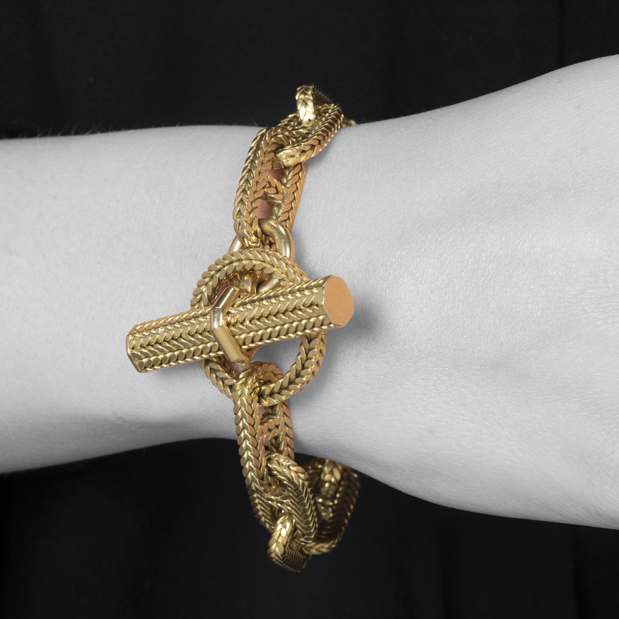 An eighteen carat yellow gold “Chaîne d’Ancre” bracelet. Signed Hermès Paris, numbered. Made by Georges Lenfant, Paris. With original case.