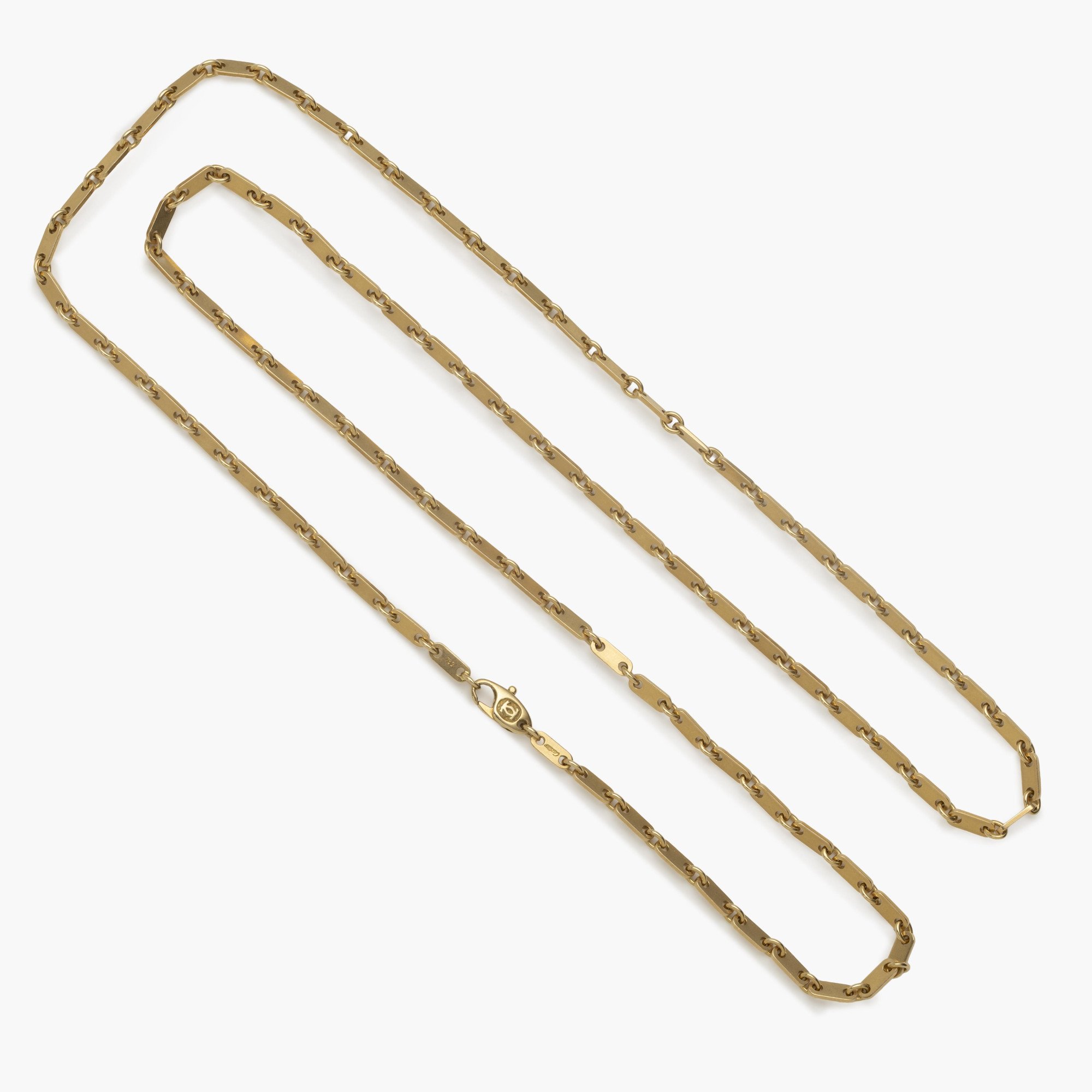 An eighteen carat yellow gold necklace ‘Fidelity’, signed Cartier, made ca 1990 and numbered. With original box.