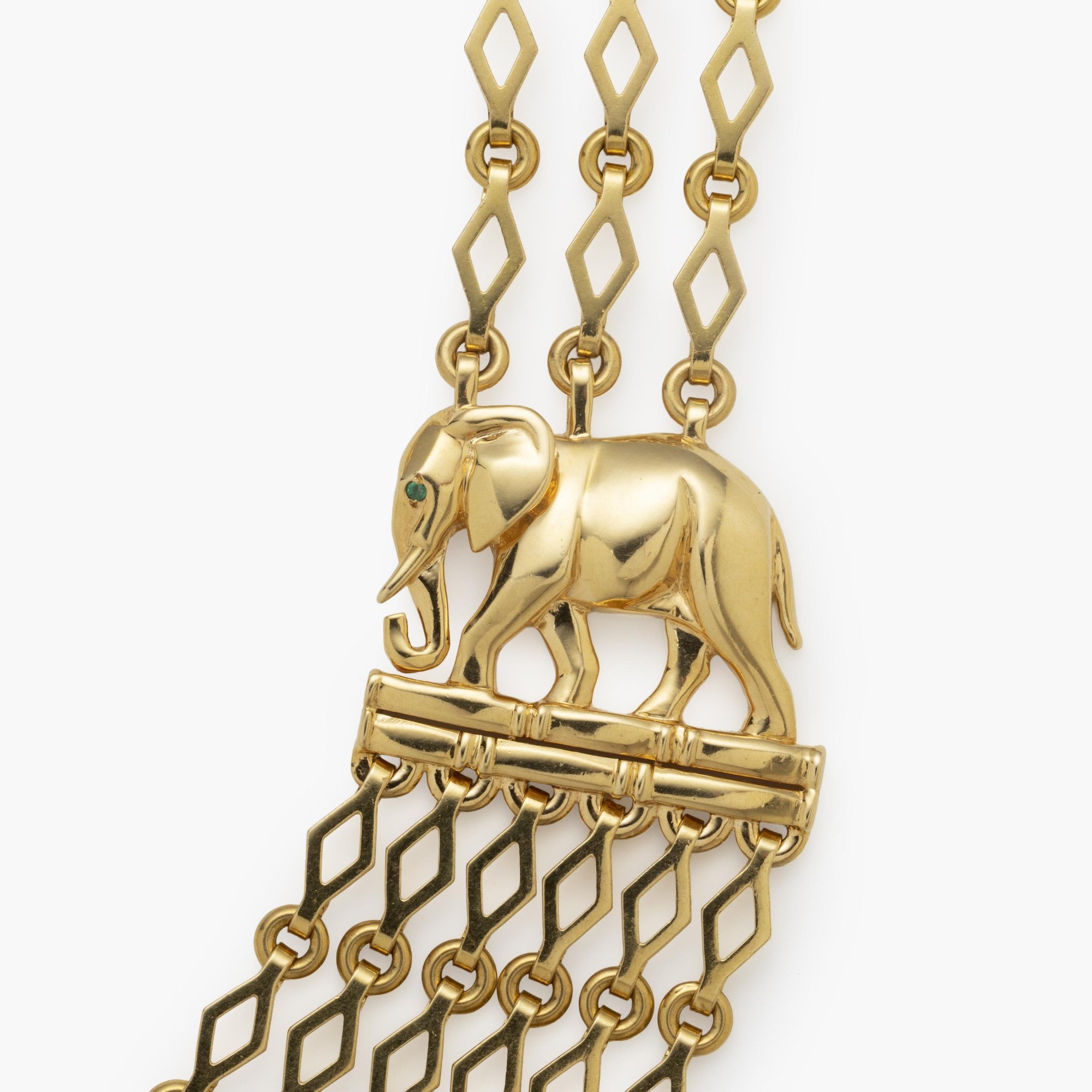 An eighteen carat yellow gold “Djigar” necklace, with two stylized elephants. Signed Cartier, Paris, circa 1995. Numbered and in original fold-over case.