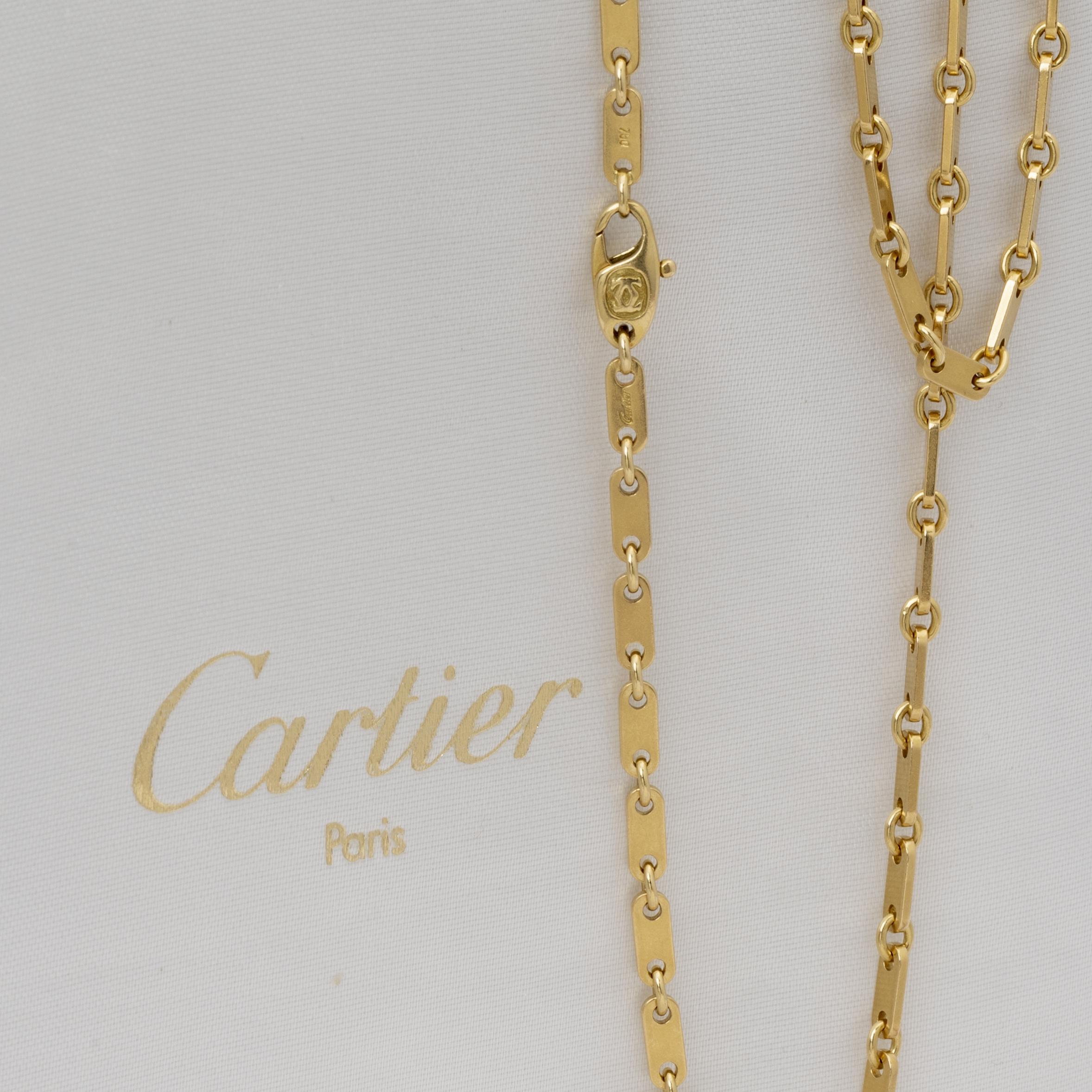 An eighteen carat yellow gold necklace ‘Fidelity’, signed Cartier, made ca 1990 and numbered. With original box.