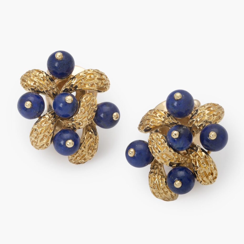 A pair of eighteen-carat yellow gold clip earrings, set with lapis lazuli beads, signed Van Cleef & Arpels, Paris, numbered and dated 1967.