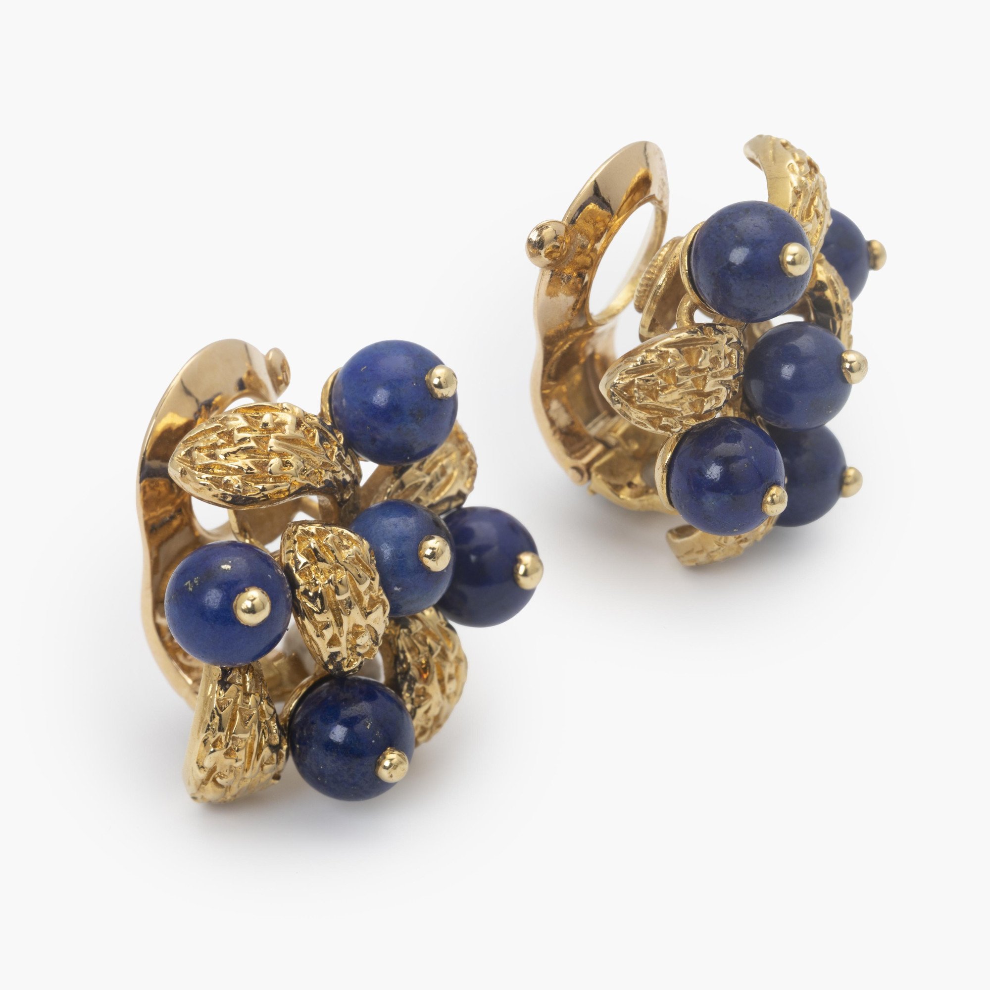 A pair of eighteen-carat yellow gold clip earrings, set with lapis lazuli beads, signed Van Cleef & Arpels, Paris, numbered and dated 1967.