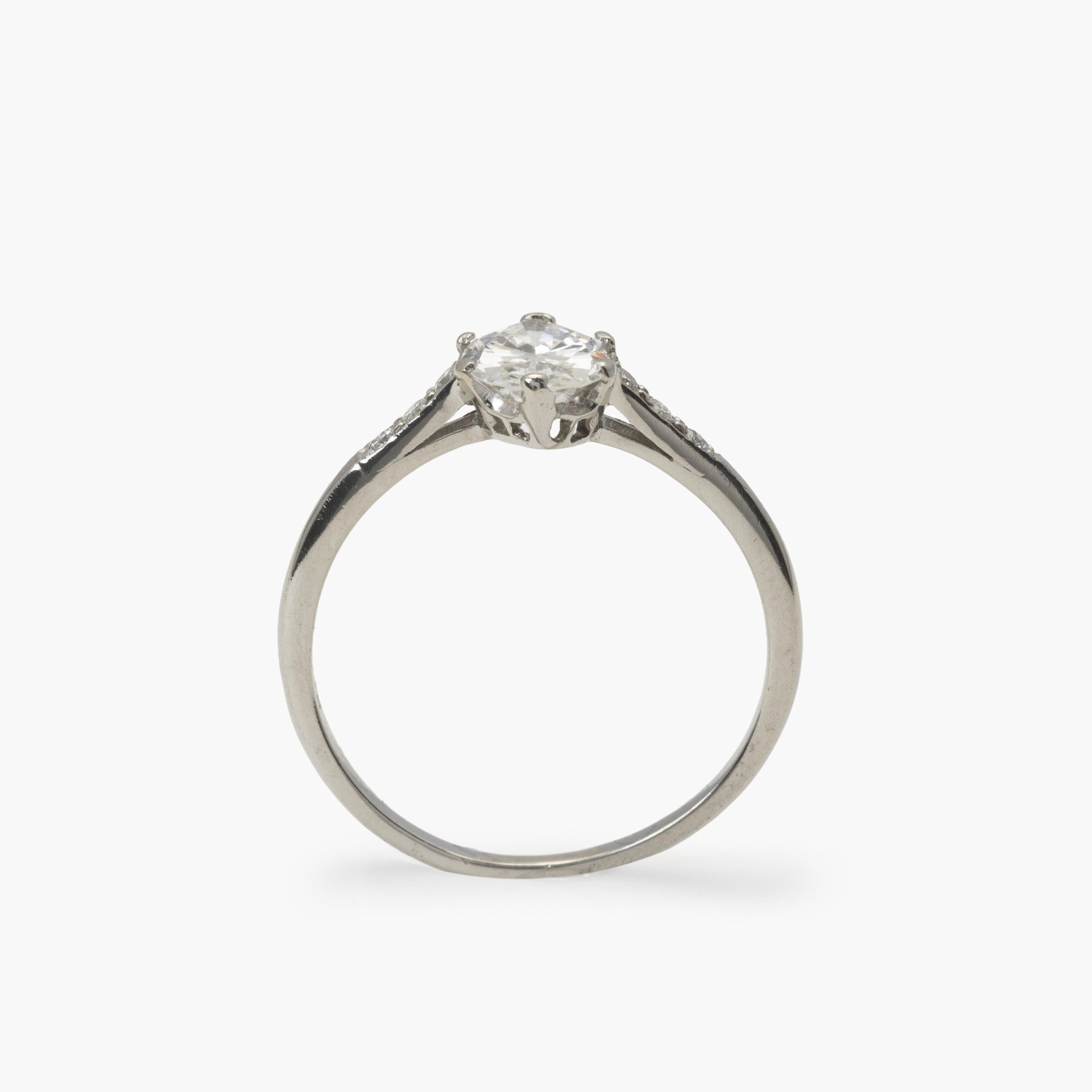 A platinum solitaire ring set with a marquise cut diamond (estimated weight 0.85 ct.). Made ca 1950.