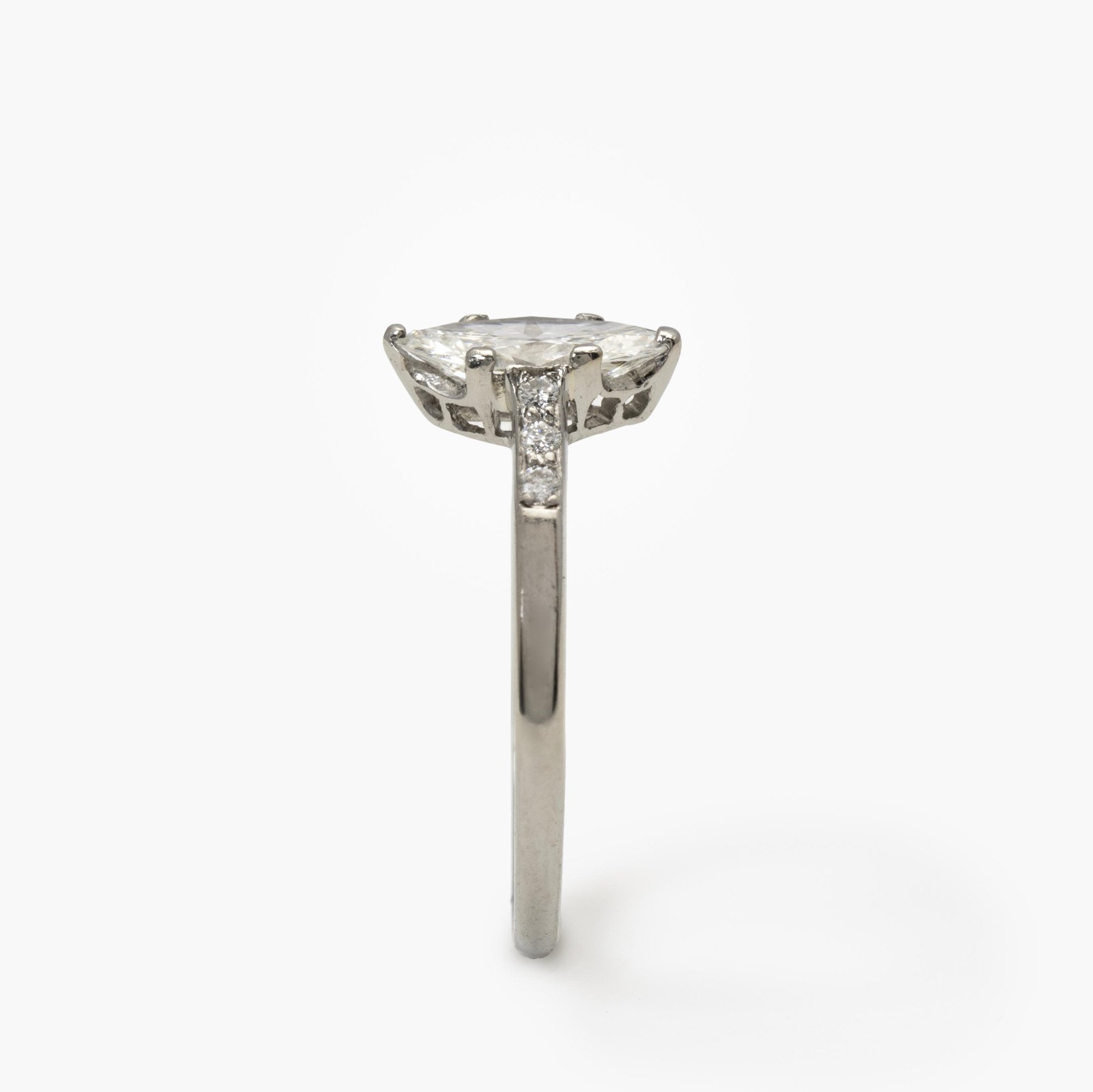 A platinum solitaire ring set with a marquise cut diamond (estimated weight 0.85 ct.). Made ca 1950.