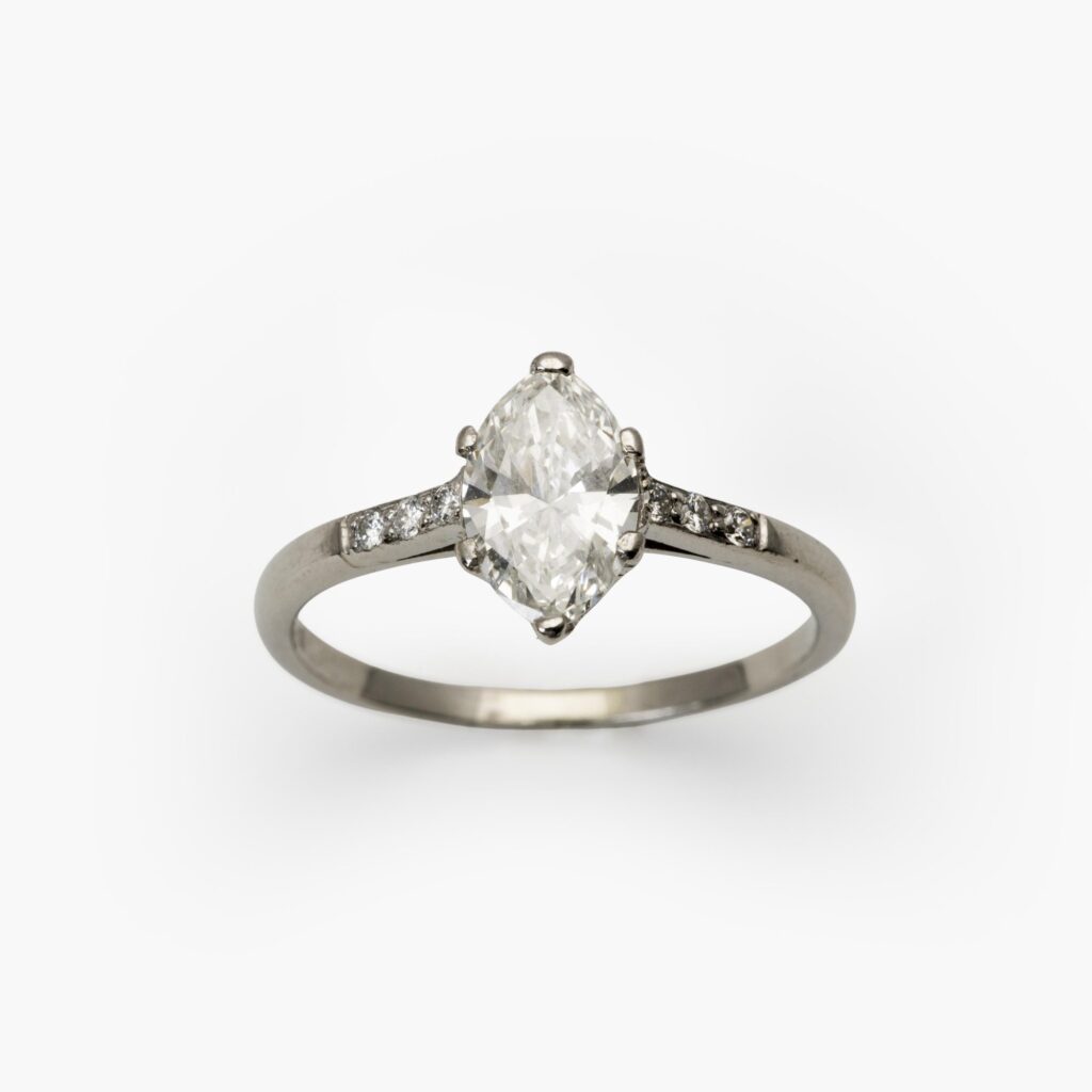 A platinum solitaire ring set with a marquise cut diamond (estimated weight 0.85 ct.). Made ca 1950.