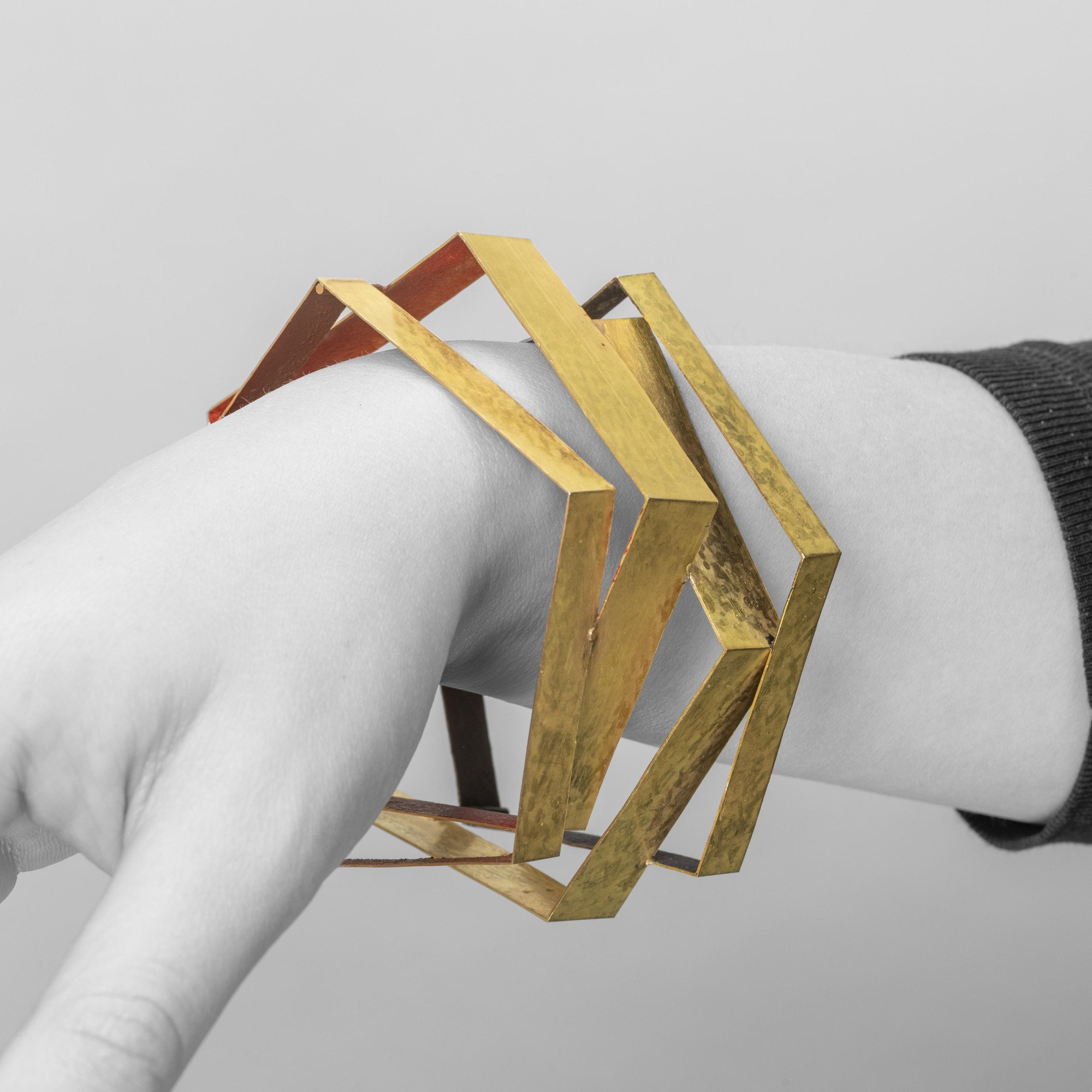 An eighteen carat yellow gold pentagonal bracelet, pigmented on the inside (brown, red, and black). Signed G. Babetto, made in Padua, ca 2012.