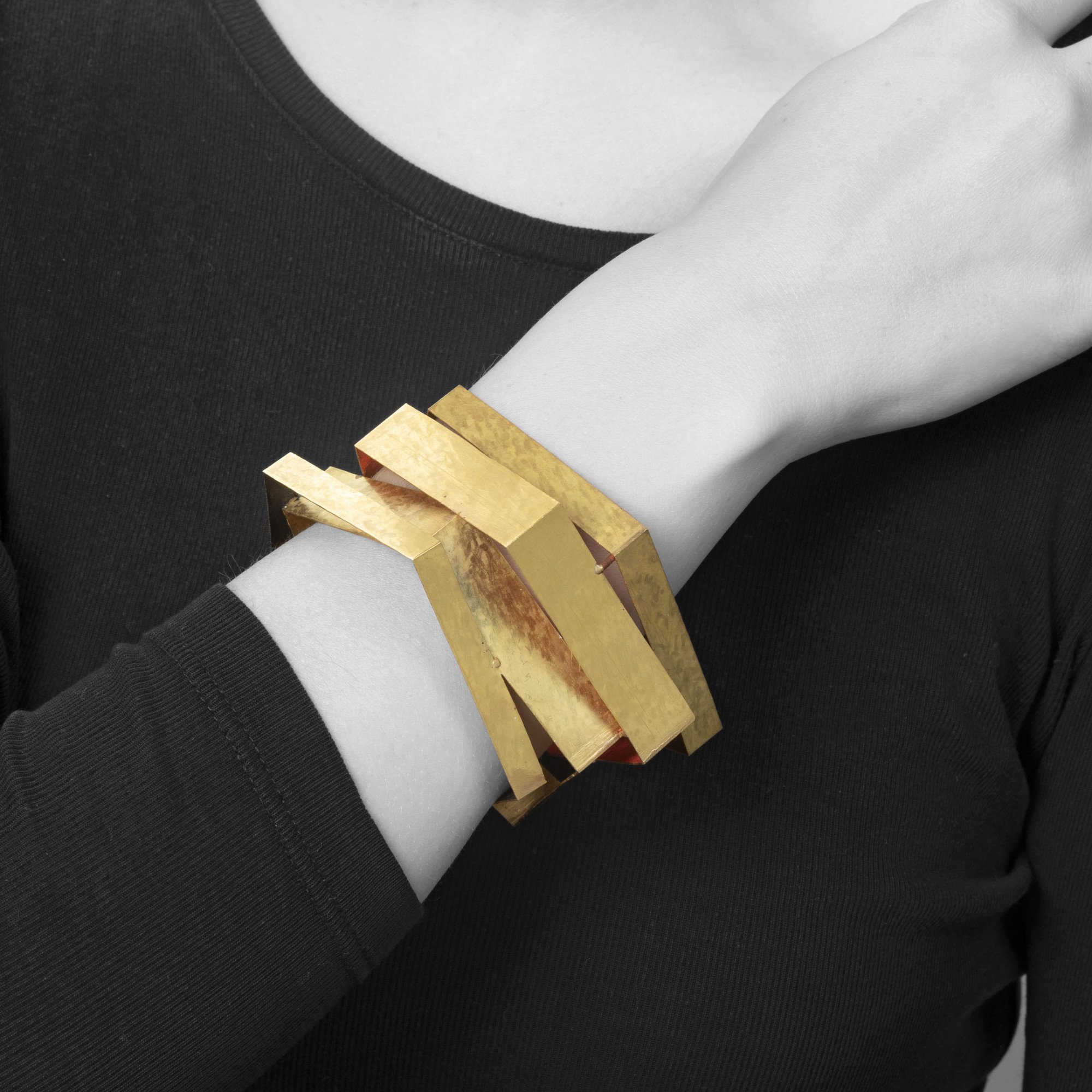 An eighteen carat yellow gold pentagonal bracelet, pigmented on the inside (brown, red, and black). Signed G. Babetto, made in Padua, ca 2012.