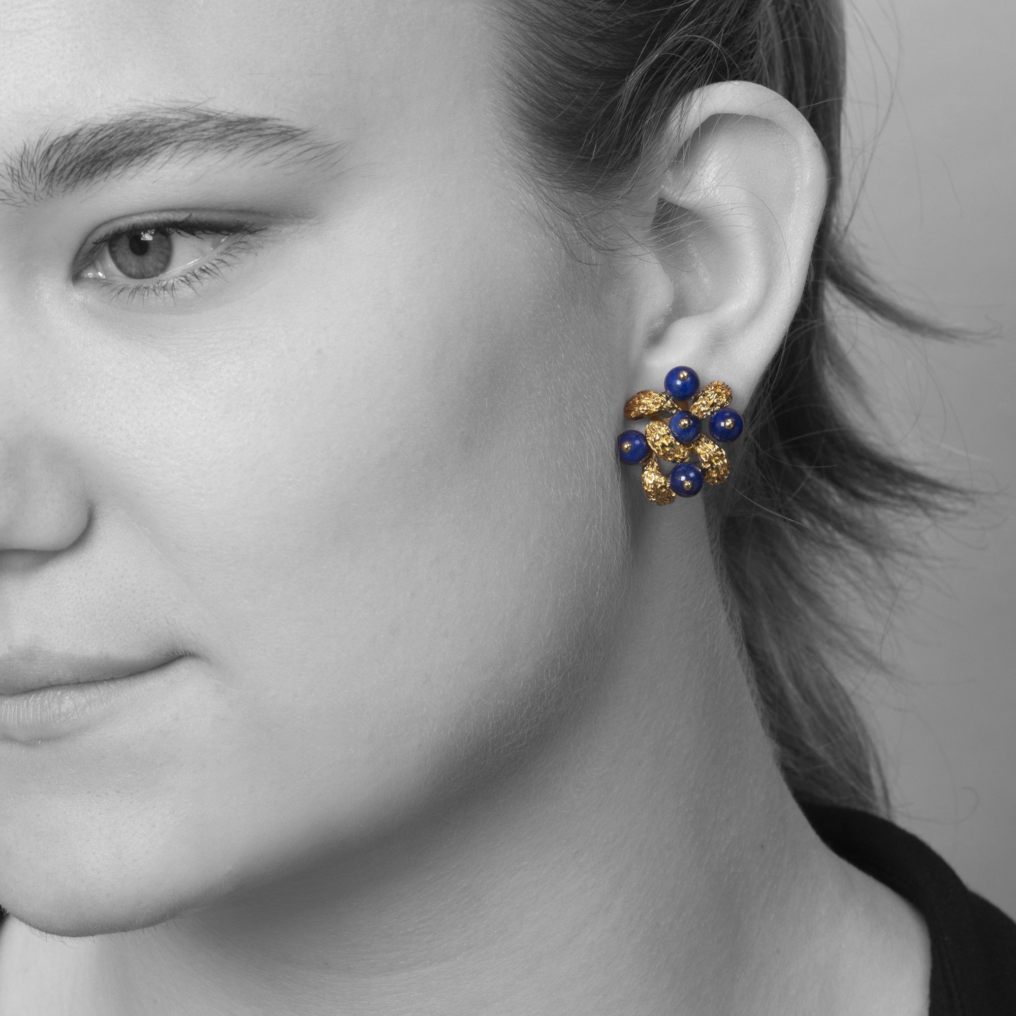 A pair of eighteen-carat yellow gold clip earrings, set with lapis lazuli beads, signed Van Cleef & Arpels, Paris, numbered and dated 1967.