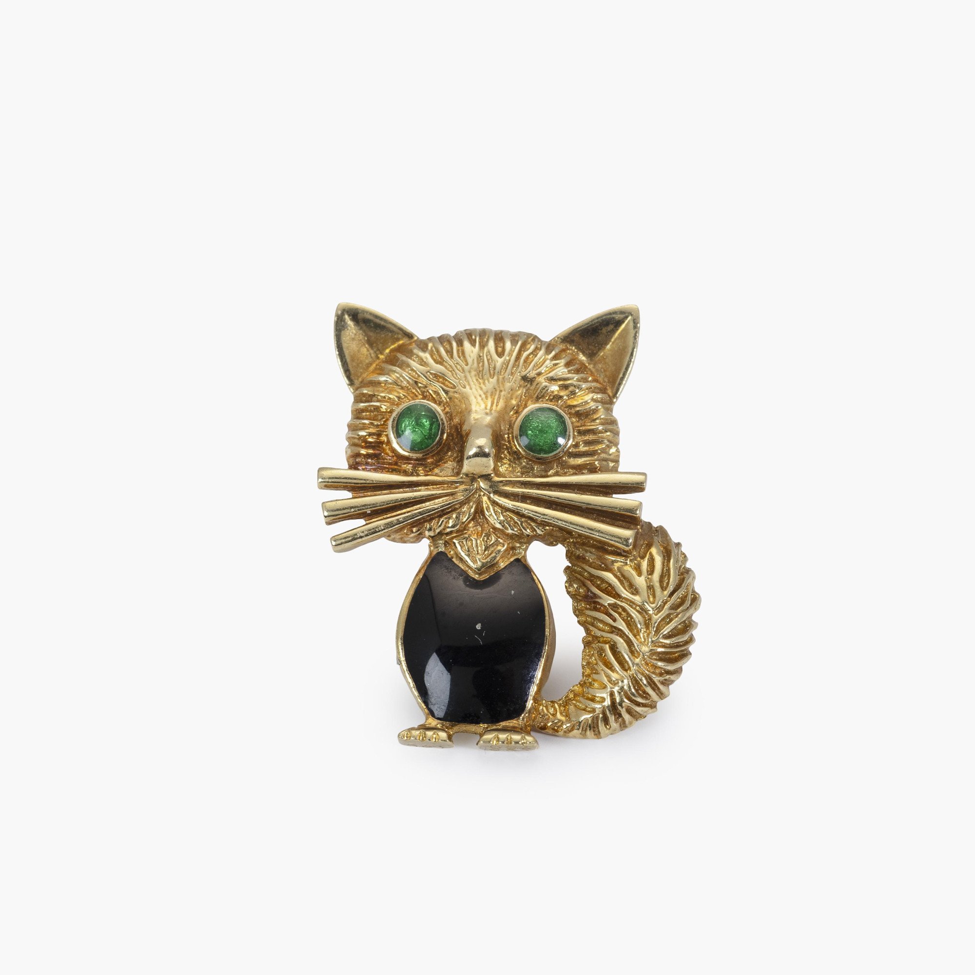 An eighteen-carat yellow gold mini pin 'Chat Malicieux'. Signed Van Cleef & Arpels, made in Paris, around 1980 and numbered.
