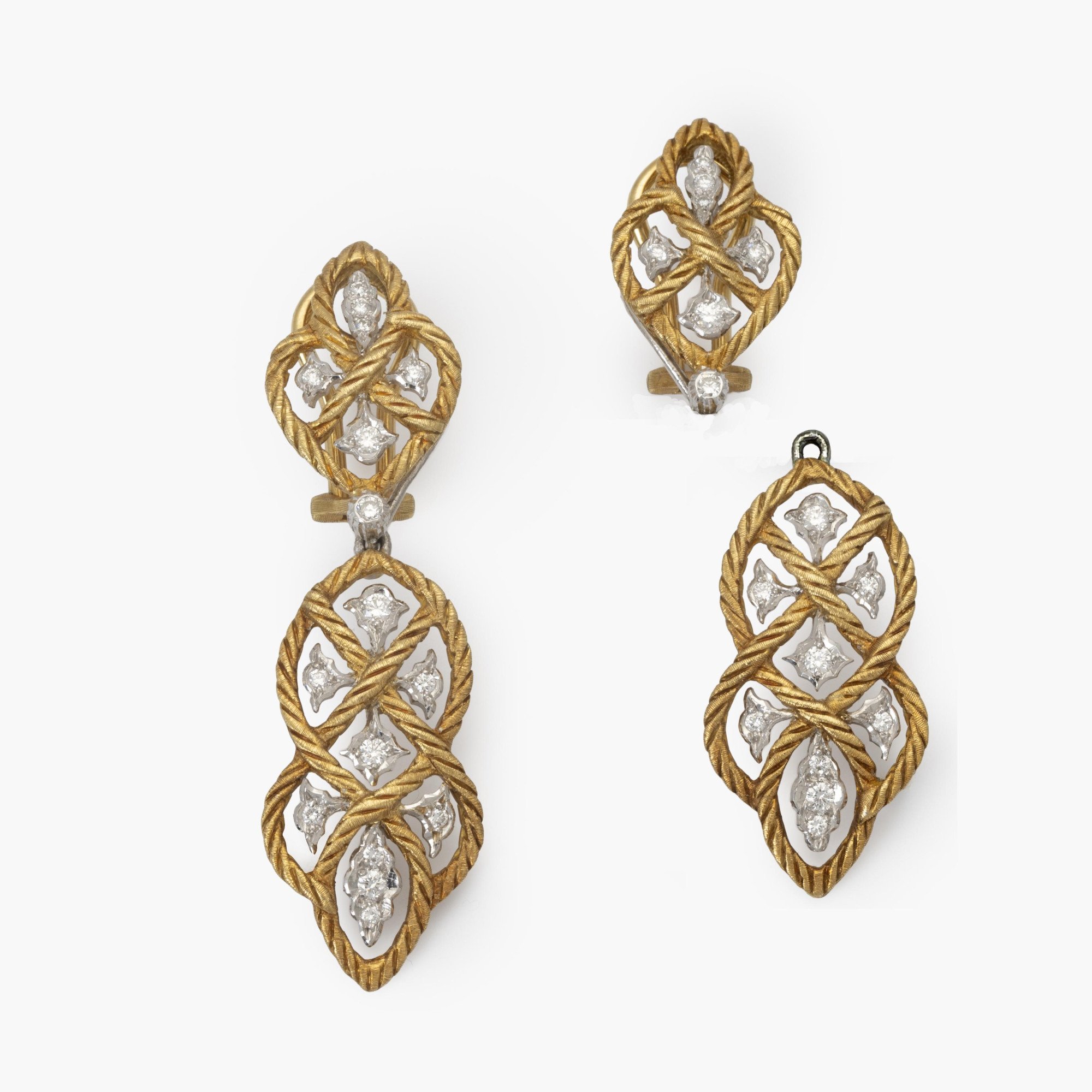 A pair of eighteen-carat yellow gold clip-earrings with detachable pendants, model ‘Étoilée’, set with diamonds. Signed Gianmaria Buccellati, Italy.